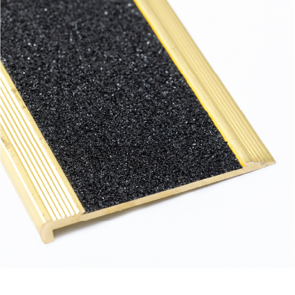 Solid brass stair nosing with carborundum grit insert